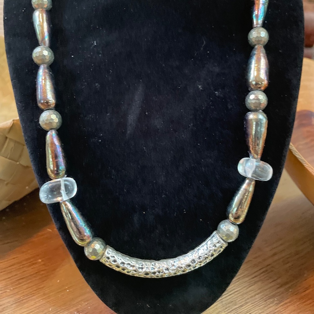 Elegant glass beaded necklace with pewter curved center